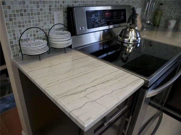 white macaubas granite countertops for vanity